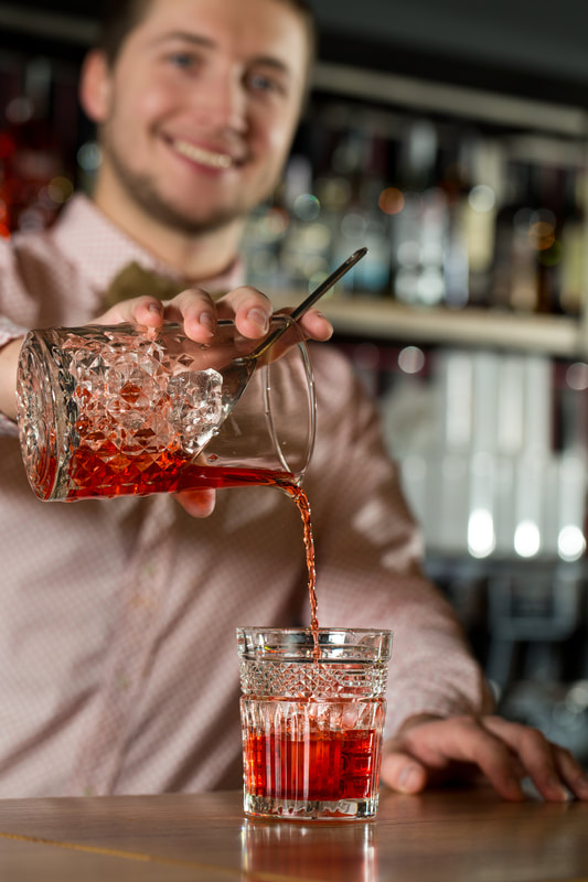 Bartender Pouring Cocktail